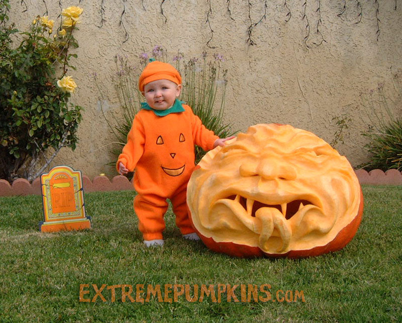 A Baby and A Giant Demon Pumpkin