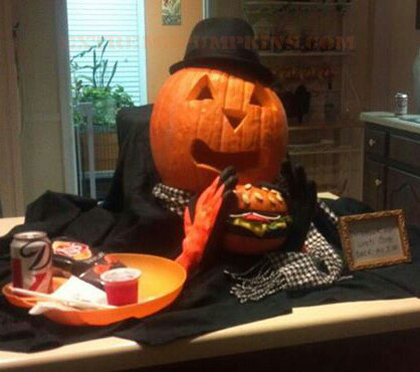 A Pumpkin Guy Eating A Pumpkin Burger