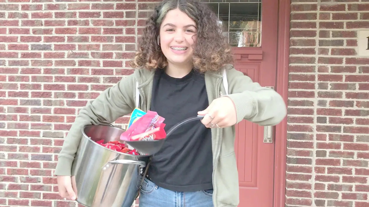 Load video: Halloween Social Distancing While Giving Out Trick Or Treat Candy