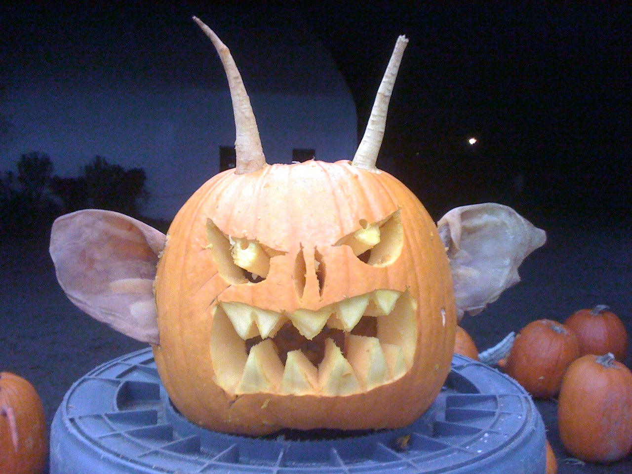 A Pumpkin Carving With Pig's Ears and Parsnips